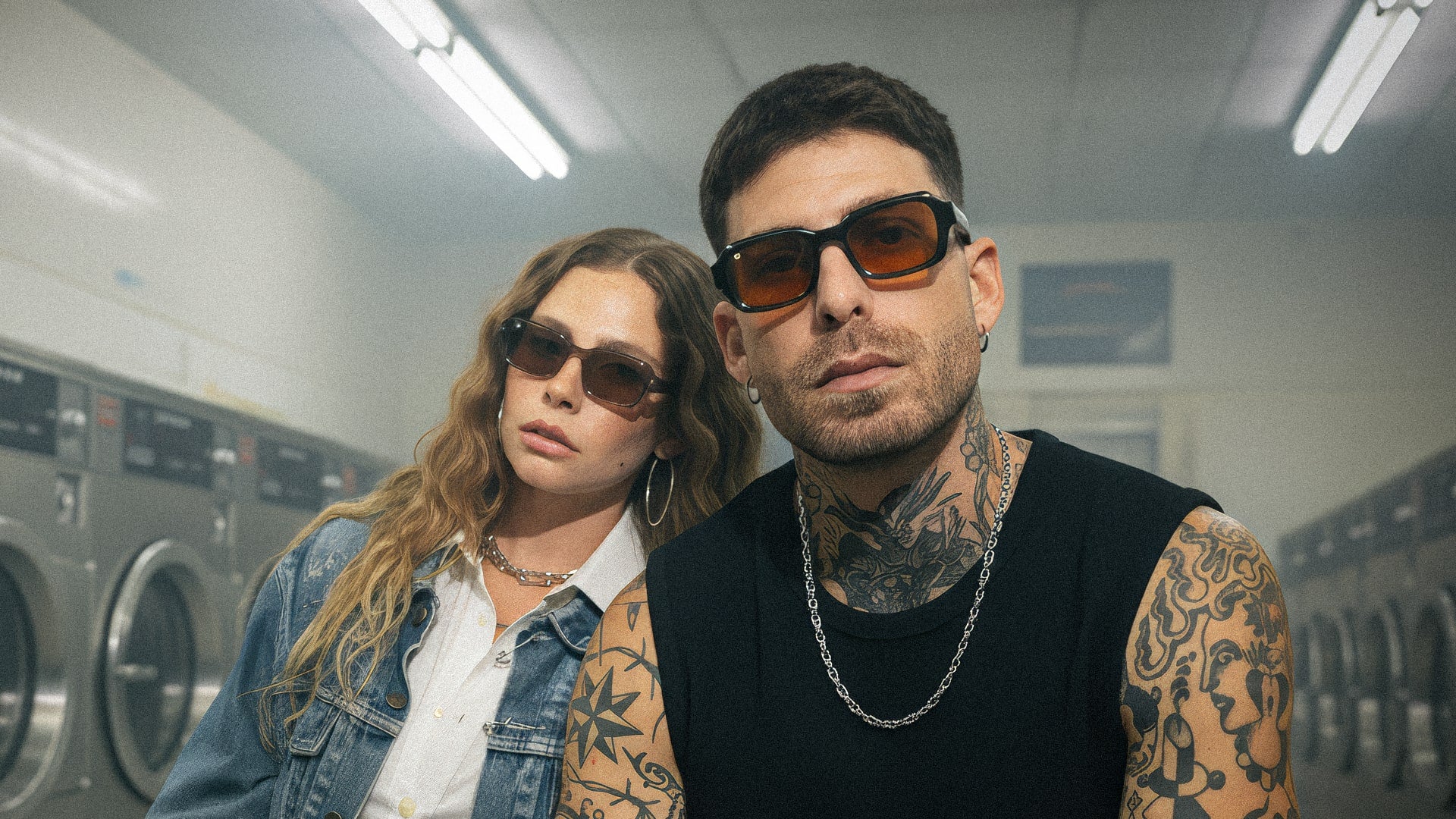 Editorial-style photo showing FORK Eyewear frames reflecting club lights — minimal, bold, and underground-inspired.